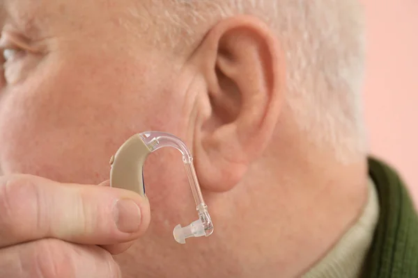 Senior man with hearing aid, closeup — Stock Photo, Image