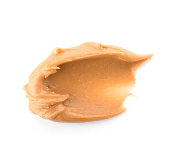 Tasty peanut butter on white background — Stock Photo, Image