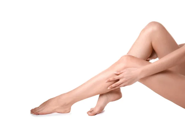 Beautiful young woman after epilation of legs on white background — Stock Photo, Image