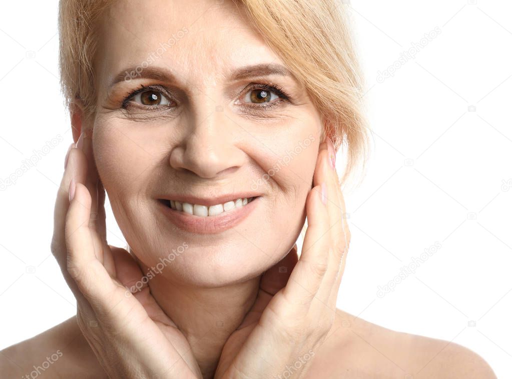 Portrait of beautiful mature woman on white background