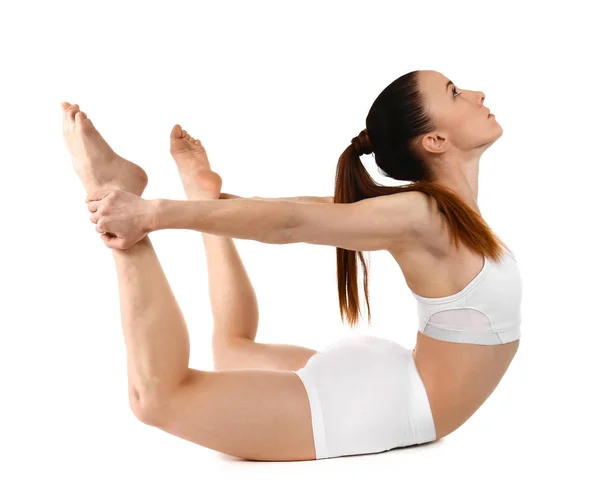 Спортивная женщина практикующая йогу на белом фоне — стоковое фото