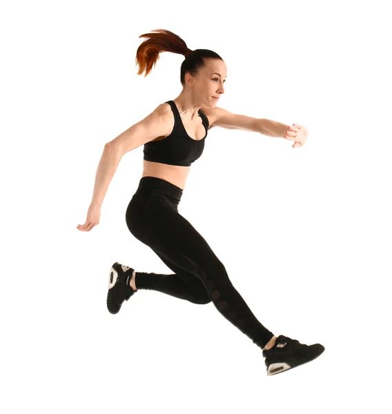 Sporty jumping woman on white background — Stock Photo, Image