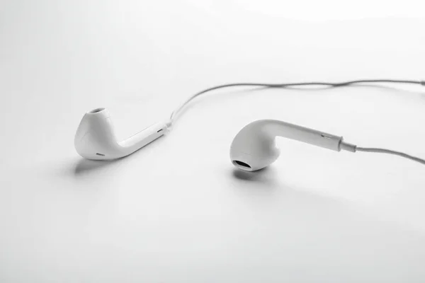 Modern earphones on white background — Stock Photo, Image