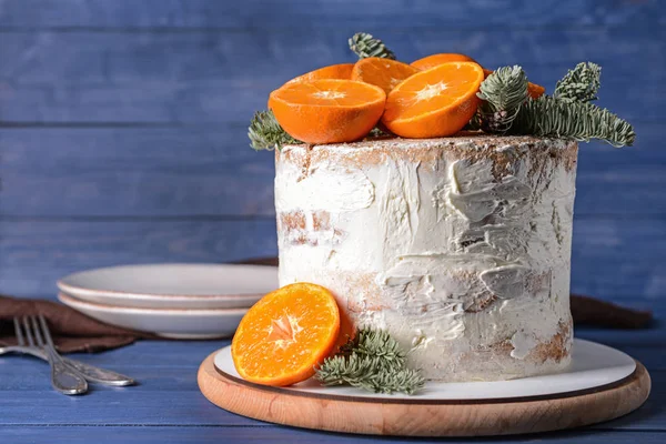 Sweet Christmas cake on wooden table — Stock Photo, Image