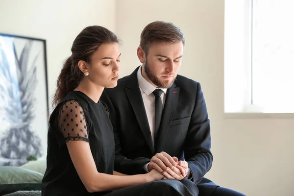 Couple pining after their relative after funeral — Stock Photo, Image