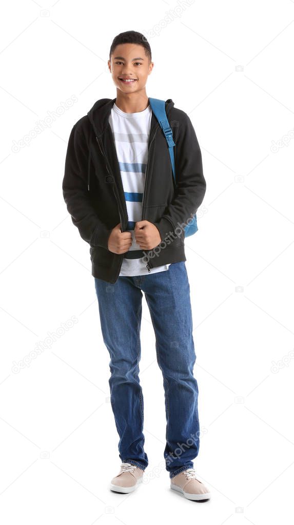 Portrait of African-American teenage boy on white background