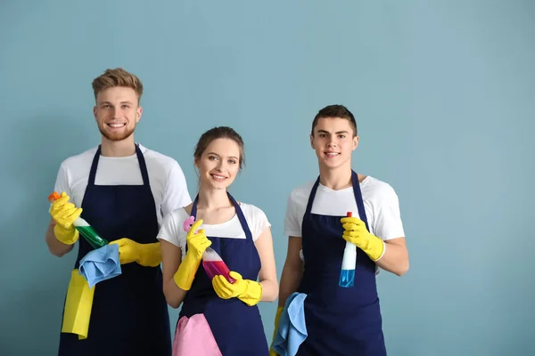 Portrait of janitors on grey background — Stock Photo, Image