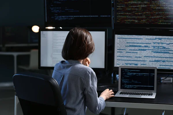 Female programmer working in office — Stock Photo, Image