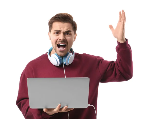 Stressed male programmer with laptop on white background — Stock Photo, Image