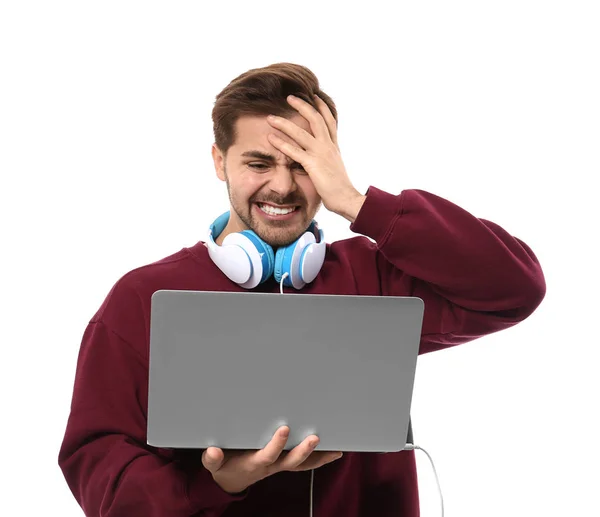 Stressed male programmer with laptop on white background — Stock Photo, Image