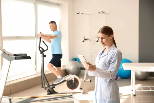 Female physiotherapist in rehabilitation center