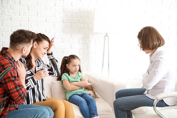 Female psychologist working with naughty little girl in office — Stock Photo, Image