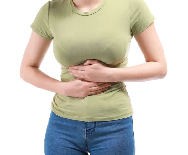 Young woman suffering from stomachache on white background — Stock Photo, Image