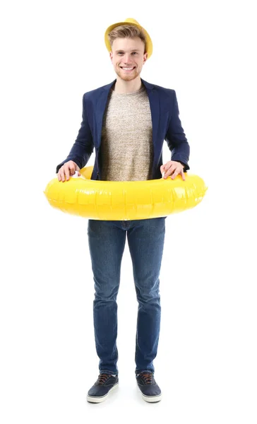 Funny young tourist with inflatable ring on white background — Stock Photo, Image