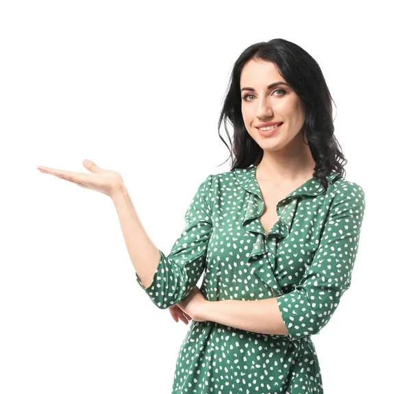 Portrait of beautiful woman holding something on white background — Stock Photo, Image