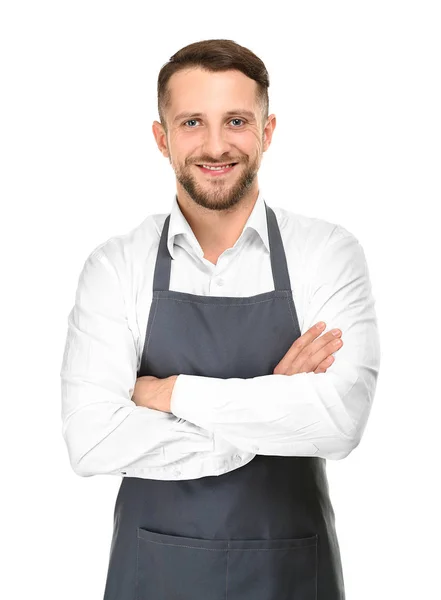 Handsome man in apron on white background — Stock Photo, Image