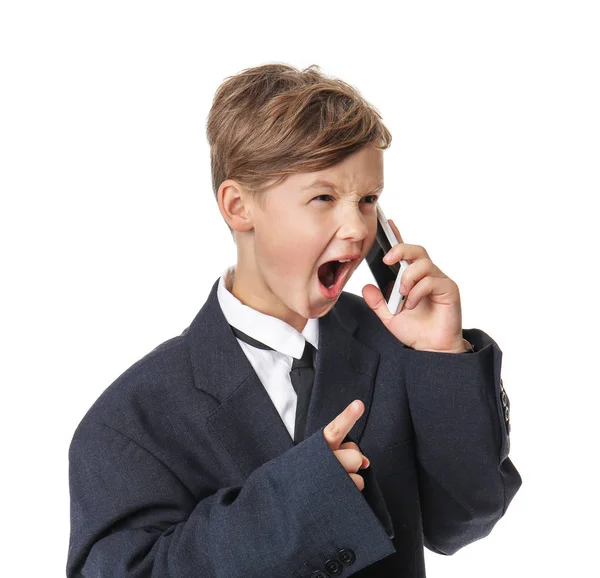 Portrait of angry little businessman talking by phone on white background — Stock Photo, Image