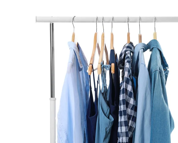 Rack with stylish clothes on white background — Stock Photo, Image