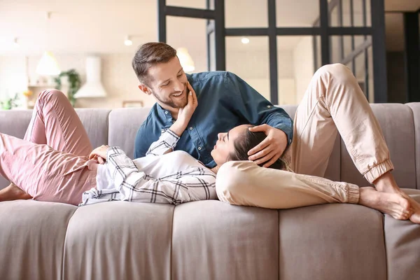 Happy young couple spending time at home — Stock Photo, Image