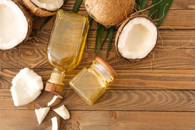 Ahşap masa üzerinde hindistan cevizi yağı ile Kompozisyon