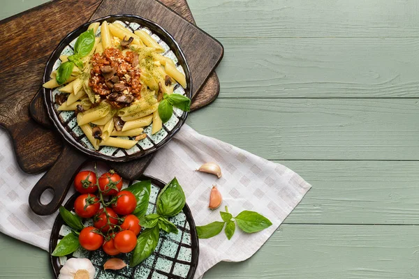 Tasty boiled pasta with tomato sauce on wooden table — Stock Photo, Image