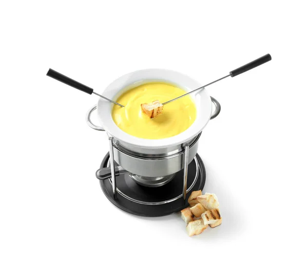 Fondue pot with melted cheese and bread on white background — Stock Photo, Image
