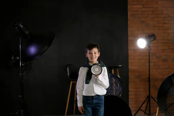 Little film director with megaphone in studio — Stock Photo, Image