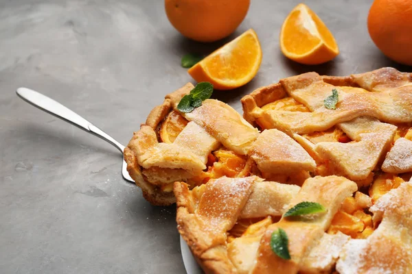 Tasty orange pie on table, closeup — Stock Photo, Image