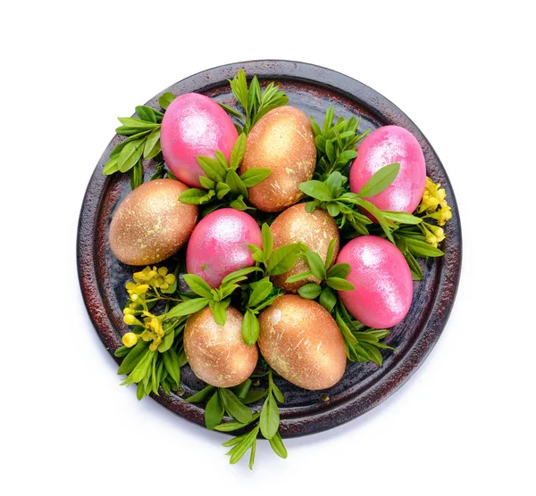 Plate with beautiful Easter eggs on white background — Stock Photo, Image