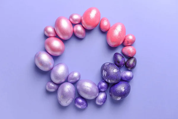 Frame made of beautiful Easter eggs on color background — Stock Photo, Image