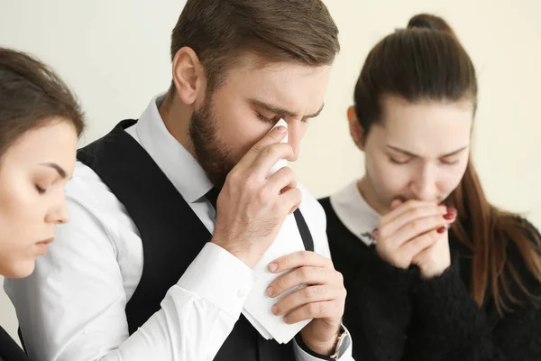 Pining relatives at funeral — Stock Photo, Image