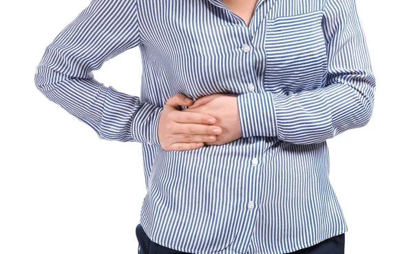 Young woman suffering from stomachache on white background — Stock Photo, Image