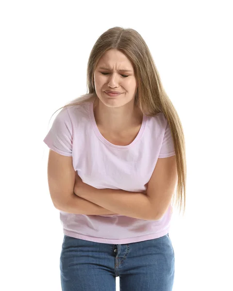 Jonge vrouw die lijdt aan buikpijn op witte achtergrond — Stockfoto