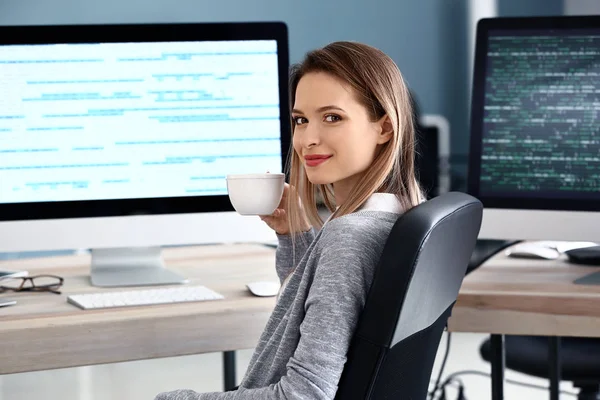 Portrait of female programmer in office — Stock Photo, Image