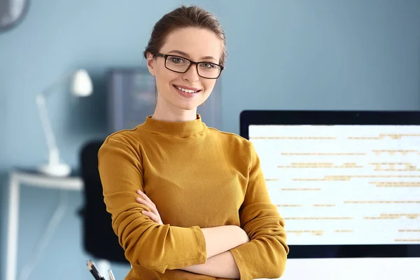 Portrait of female programmer in office — Stock Photo, Image
