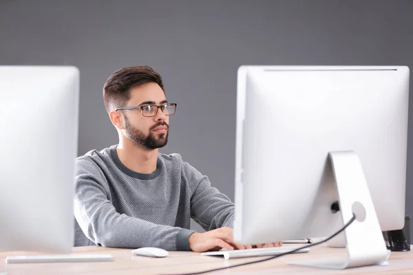 Male programmer working in office — Stock Photo, Image