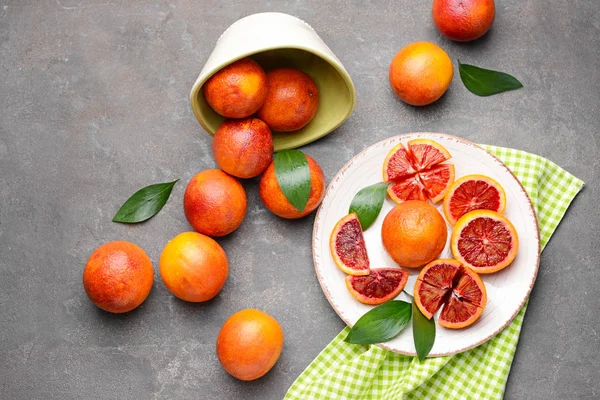 Fresh blood oranges on grunge background — Stock Photo, Image