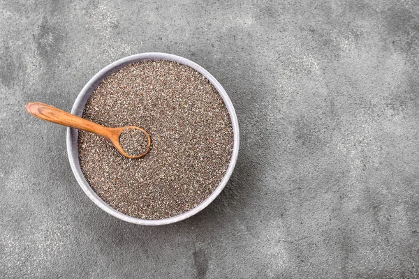 Bowl with chia seeds on table — Stock Photo, Image