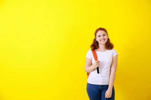 Cute teenage girl on color background — Stock Photo, Image