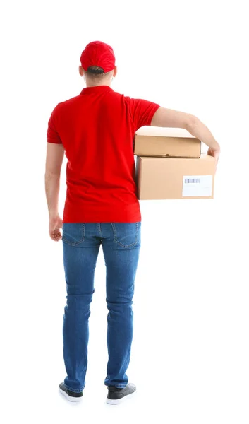 Handsome delivery man with boxes on white background, back view — Stock Photo, Image