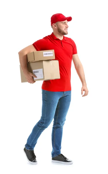 Handsome delivery man with boxes on white background — Stock Photo, Image