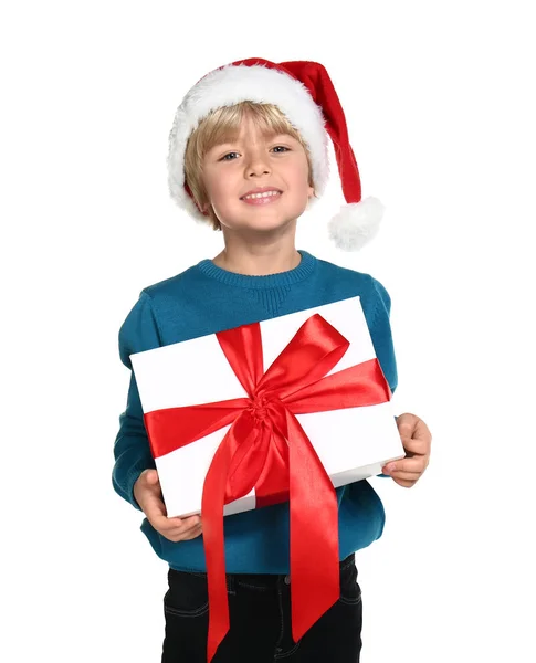 Menino bonito com presente de Natal no fundo branco — Fotografia de Stock