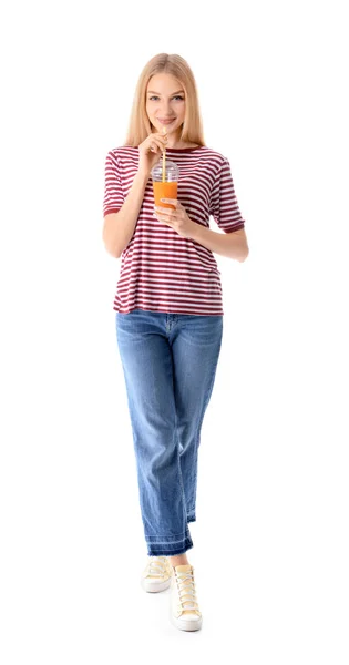 Beautiful young woman with fresh juice on white background — Stock Photo, Image