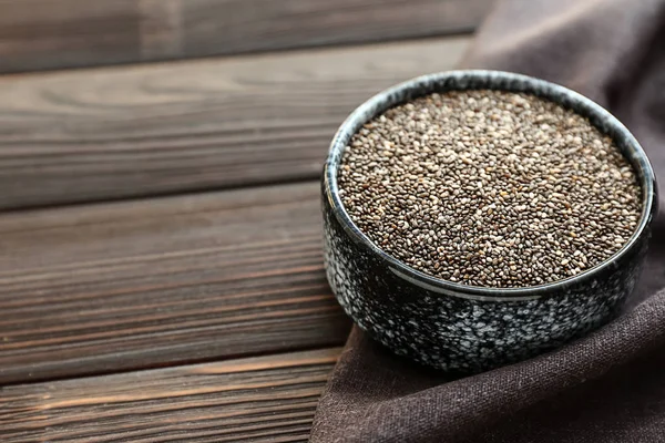 Bowl with chia seeds on wooden table — Stock Photo, Image