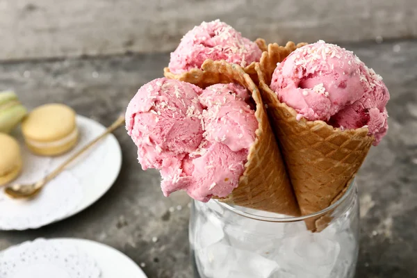Tasty ice cream on grey table, closeup — Stock Photo, Image