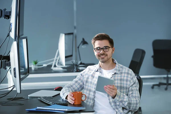 Portrait of male programmer in office — Stock Photo, Image