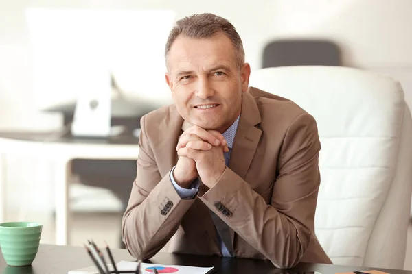 Handsome mature businessman in office — Stock Photo, Image