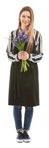 Девушка флористка с букетом на белом фоне — стоковое фото