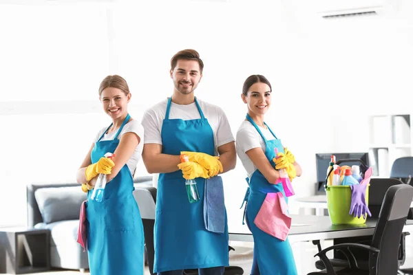 Team of janitors in office — Stock Photo, Image