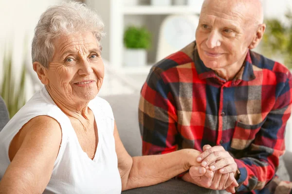 Portrait of happy senior couple at home — Stock Photo, Image